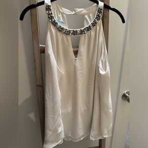 Maurice’s jeweled top